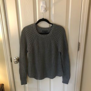 Gray cable-knit sweater